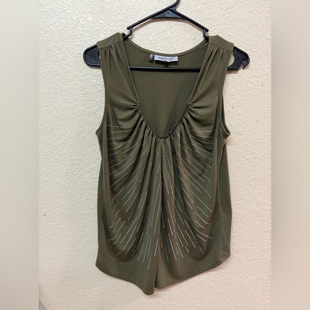 Jennifer Lopez deep plunge sleeveless blouse
